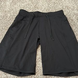 Men’s, size medium, Hylete brand athletic shorts. Black with gray emblem.